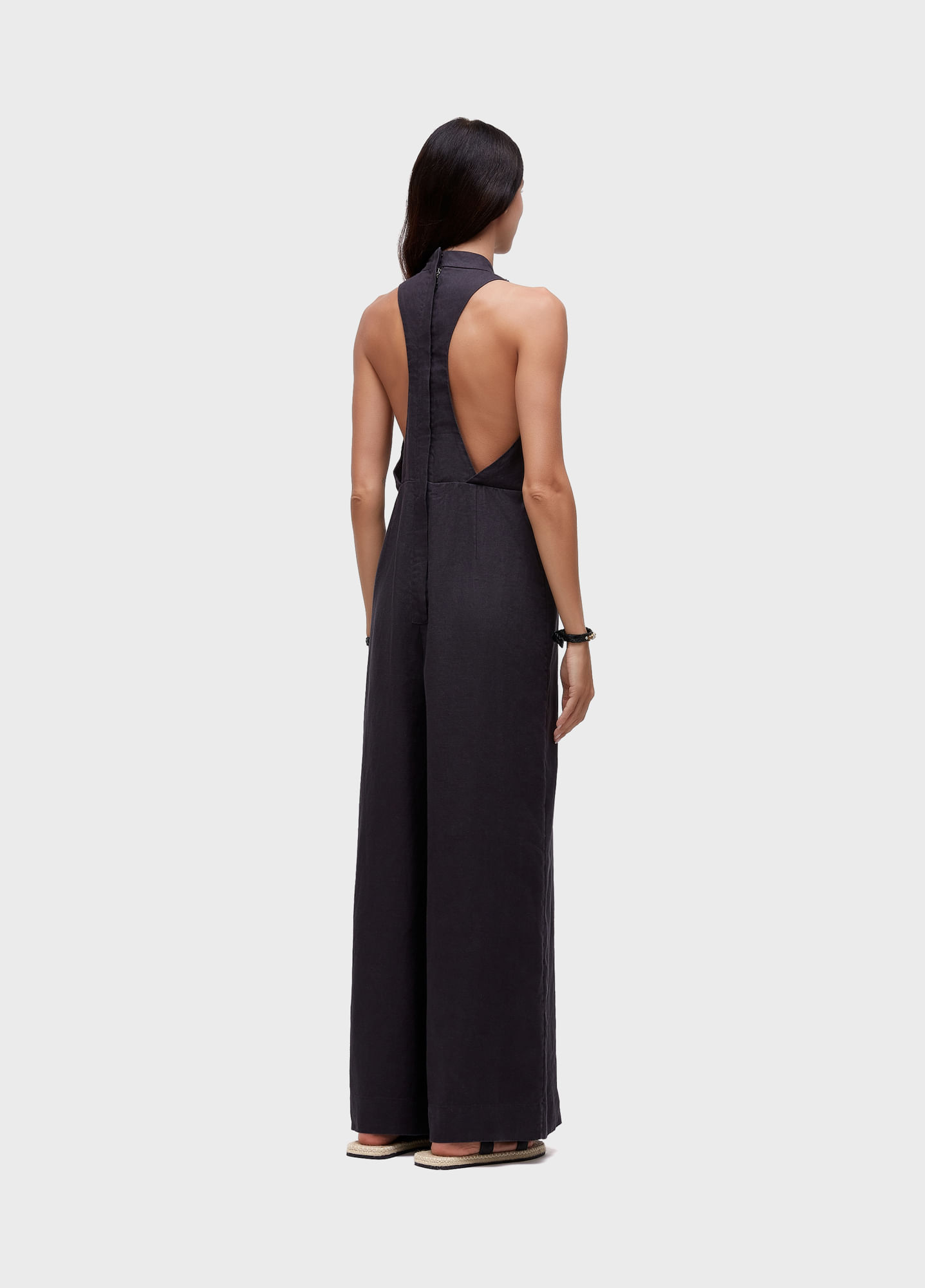 Sleeveless jumpsuit tuxedo-style with piping